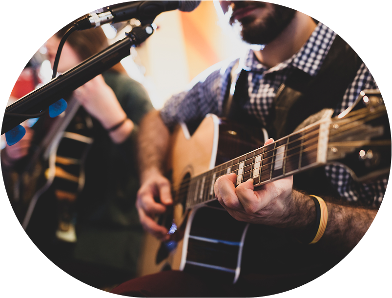 man playing a guitar
